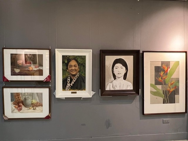 Portraits of outstanding Vietnamese women like heroines Vo Thi Sau (left) and Nguyen Thi Dinh are being displayed at the Women, Country and Love exhibition.  Photo courtesy of Dao Le Huong