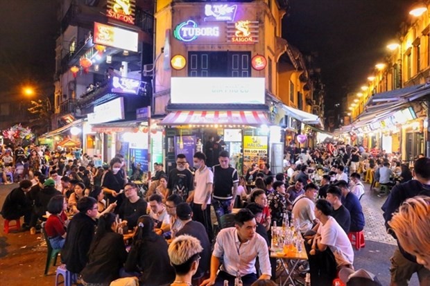 Ta Hien Street in Hanoi is returning to its well-known hustle and bustle after two years of COVID-19 restrictions. (Photo: VNA)