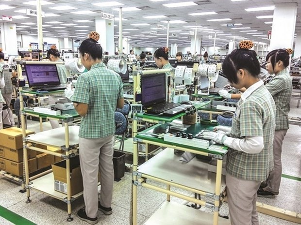 Viet Nam’s efforts in keeping foreign investors pay off. (Source: congthuong.vn)