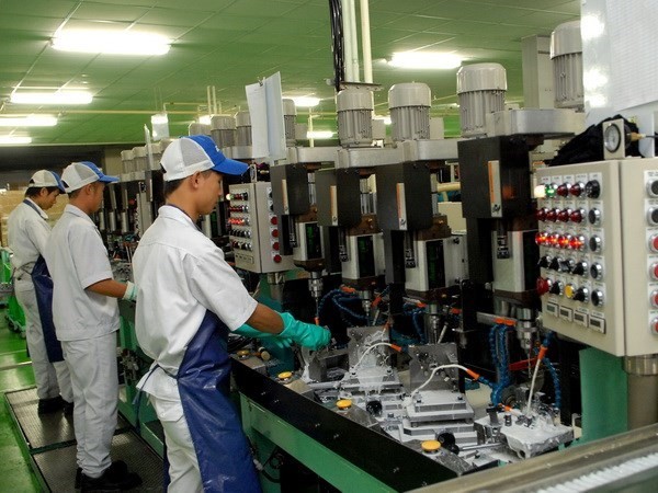 An auto component production line of Keihin Vietnam Co Ltd. The issues around the pandemic and price rises also impacted new orders at the end of the first quarter (Photo: VNA)