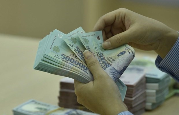 Reference exchange rate up 7 VND. (Photo: VNA)