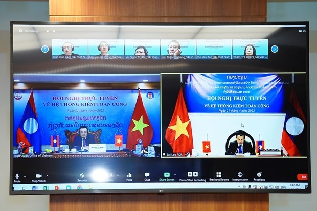The State Audit of Vietnam (SAV) cooperates with its Lao counterpart to hold a workshop to exchange practices in building the public audit system via video teleconference on April 21. (Photo: VNA)