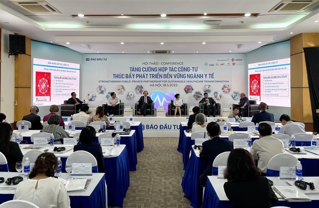 A panel discussion at the conference on strengthening ‘Public-Private Partnership for sustainable healthcare transformation’ in Hà Nội on May 18. (Photo: VNS)