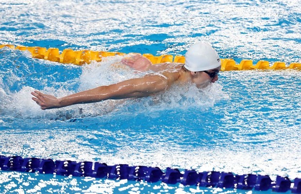 Nguyen Huy Hoang comes first in men's 200m butterfly. (Photo: VNA)