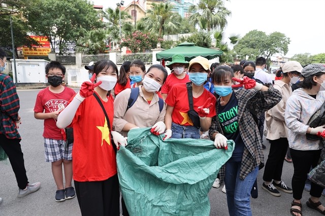 Thousands of volunteers join hands to clean up Vietnam