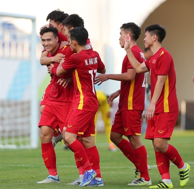 Vietnamese players celebrate their second goal in the 2-0 win over Malaysia during the AFC U23 Championship. (Photo of VFF)