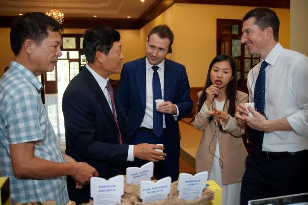 Mr Tran Van Tung introduces coffee and agri-food products to DHOM Mark Tattersall