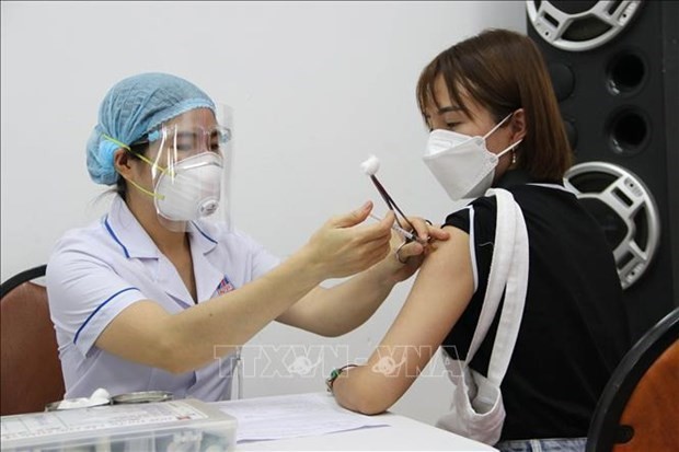 COVID-19 vaccination. (Photo: VNA)