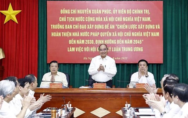 President Nguyen Xuan Phuc (standing) chairs the meeting in Hanoi on August 11. (Photo: VNA)