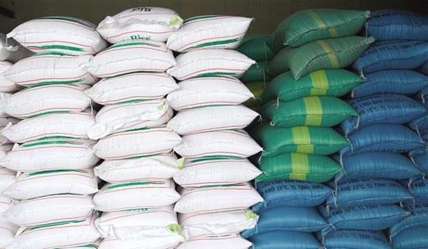 Farmers in south-central provinces receive rice before harvest season. (Source: VNA)