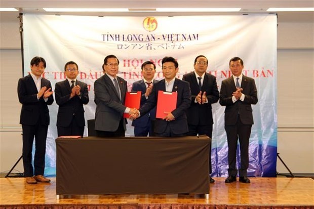 A signing ceremony at the event (Photo: VNA)