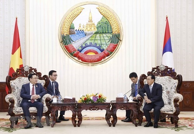 National Assembly Chairman meets with Lao Prime Minister, discussing measures to boost ties