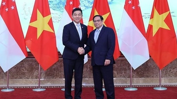 Prime Minister Pham Minh Chinh welcomes Speaker of the Singaporean Parliament