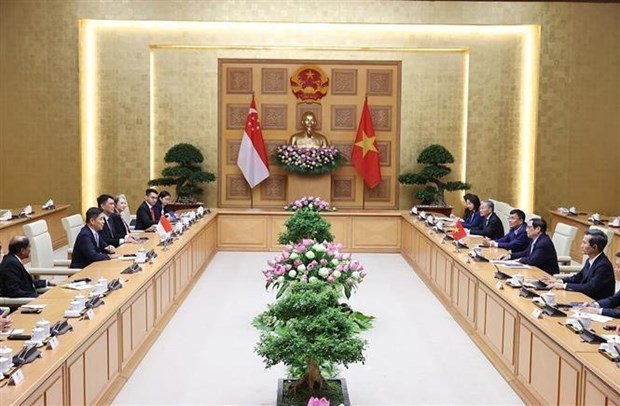 Prime Minister Pham Minh Chinh welcomes Speaker of Singaporean Parliament