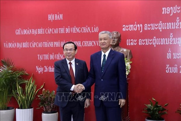 Ho Chi Minh City, Lao capital Vientiane step up cooperation
