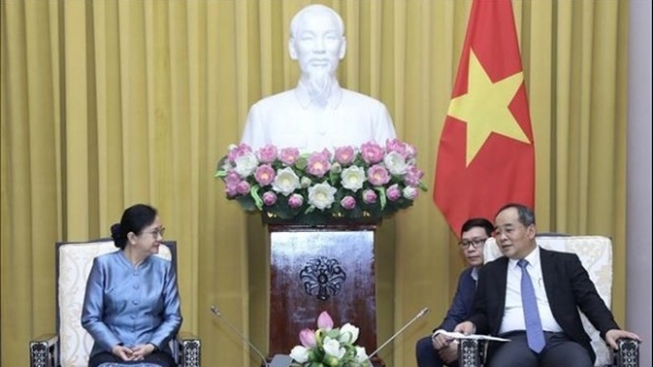 Presidential Offices of Vietnam, Laos enhance ties