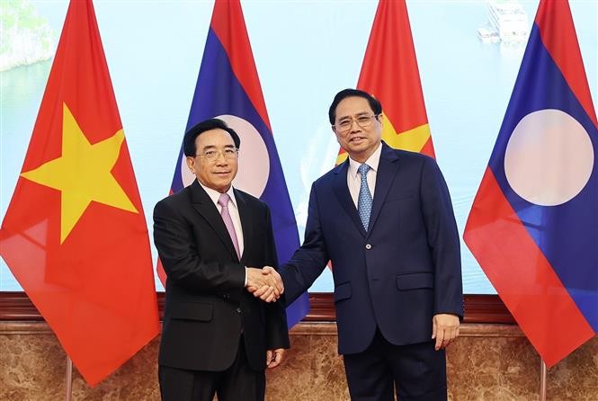Thủ tướng Phạm Minh Chính chủ trì Lễ đón Thủ tướng Lào Phankham Viphavanh thăm chính thức Việt Nam. (Nguồn: TTXVN)