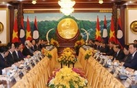 party general secretary president meets former leader of laos