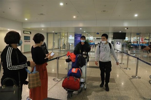 Third flight carrying Vietnamese in Ukraine lands in Hanoi