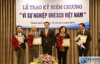 20 individuals presented with UNESCO Vietnam insignia