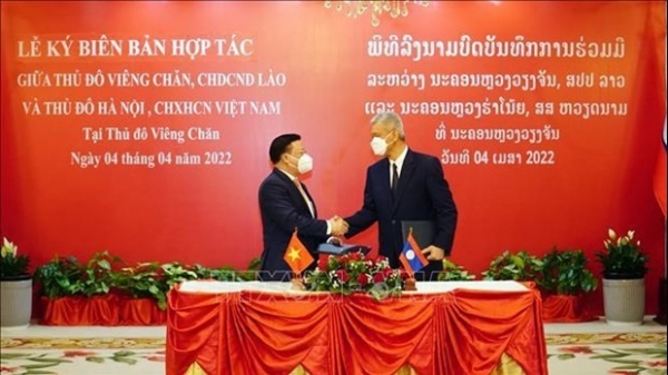 Ha Noi, Vientiane enhance cooperation