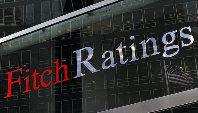 fitch revises vietnams outlook to positive