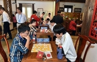 vietnamese gms reap positive results at fide grand swiss
