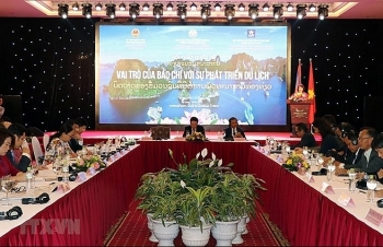 Role of Vietnamese, Lao media in tourism development discussed