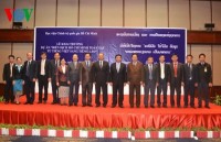 president vietnam laos strive to develop relations practically
