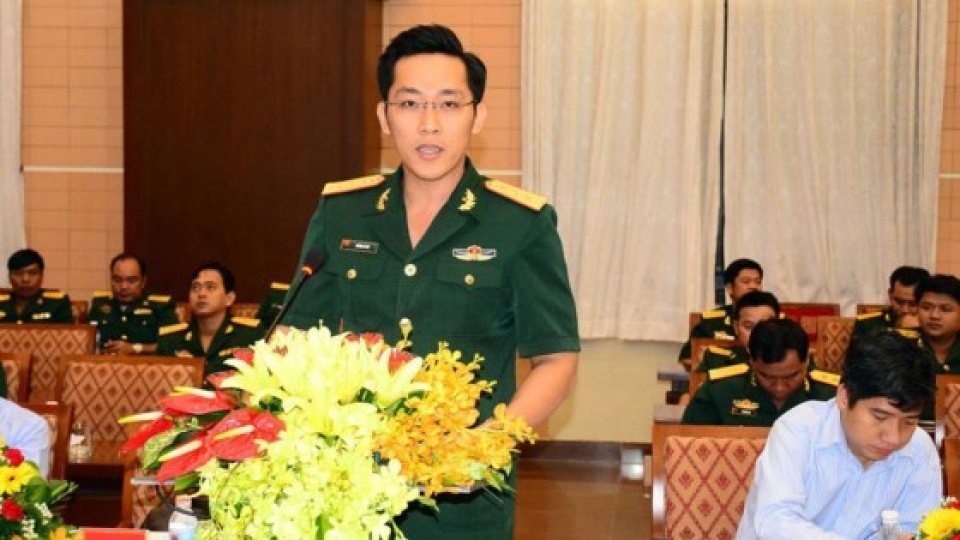 young vietnamese cambodian military officers hold exchange