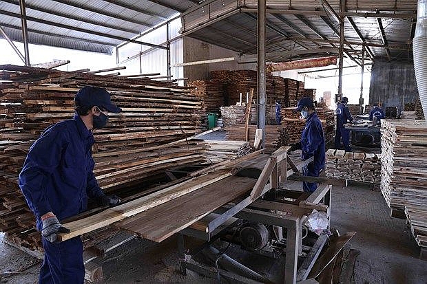 binh dinhs wood exports surge 21 percent despite pandemic