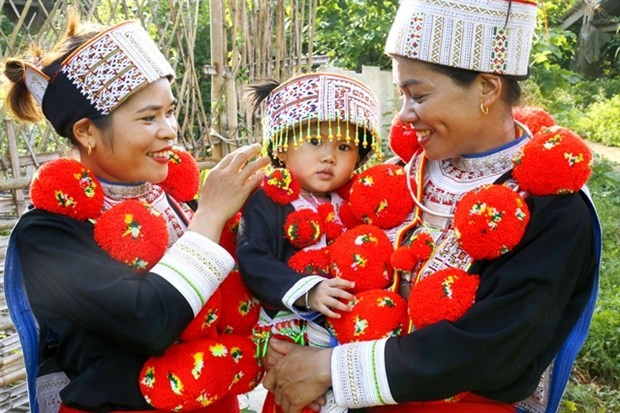 Women of Red Dao ethnic minority in their traditional attire. (Photo: VNA)
