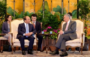 Vietnam, Singapore satisfied with thriving relations