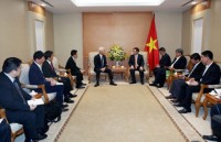 pm nguyen xuan phuc hails vietnam laos banking cooperation