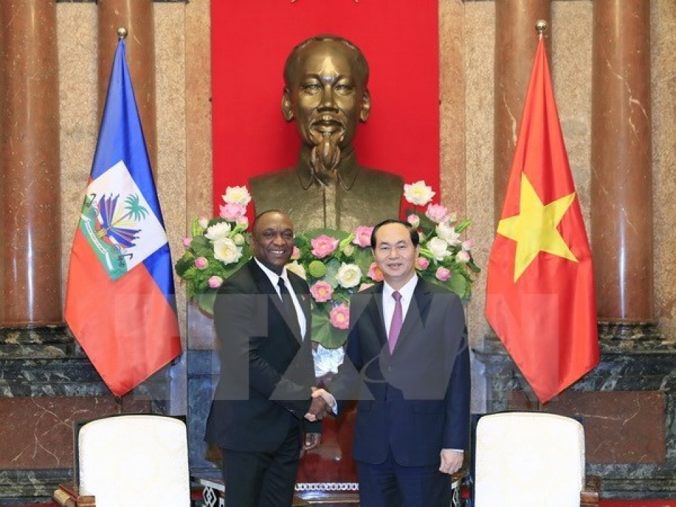 president tran dai quang meets haitian senate president