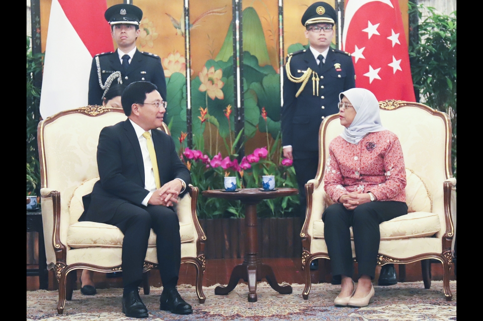 deputy pm pham binh minh meets singaporean leaders